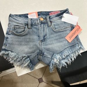 Girls Blank NYC “mini lenox” distressed denim shorts